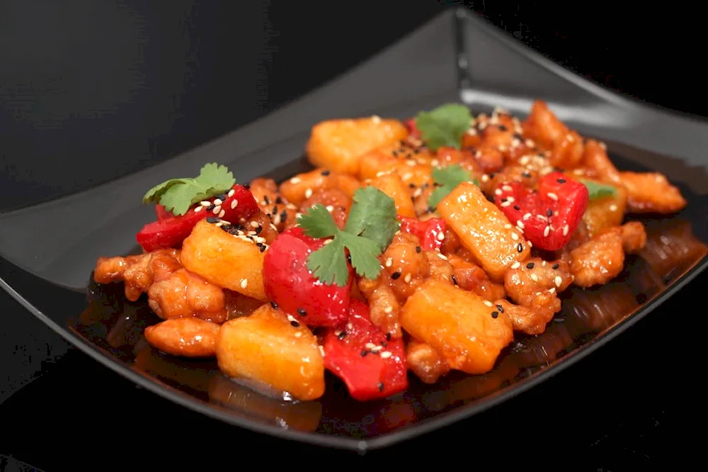 Sudak in sweet and sour sauce