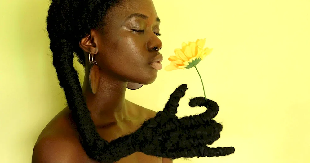 Girl with palm tree leaf