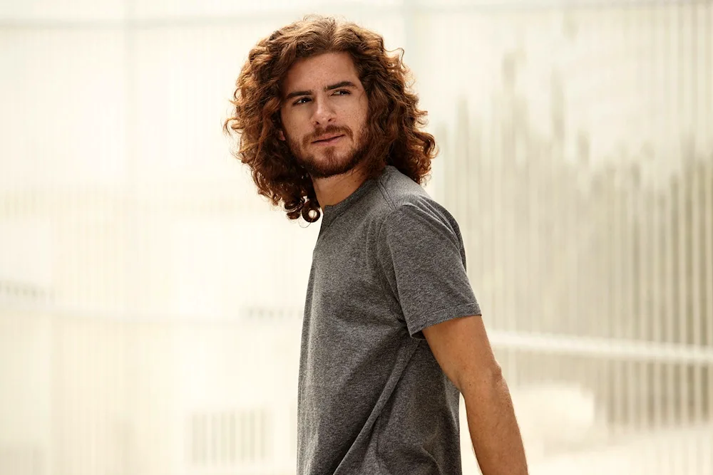 Long curly hair man