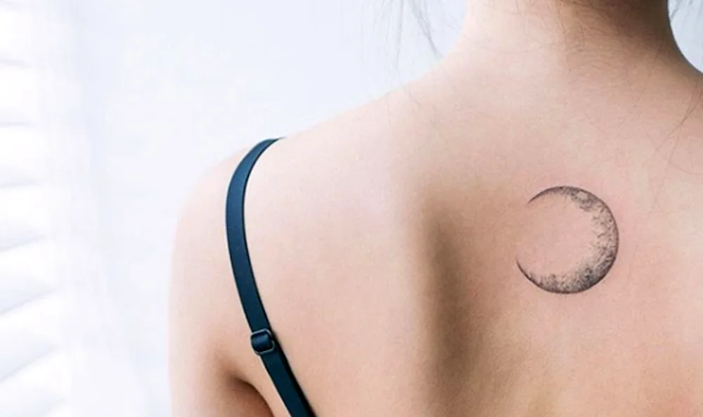 Lunar crescent moon tattoo