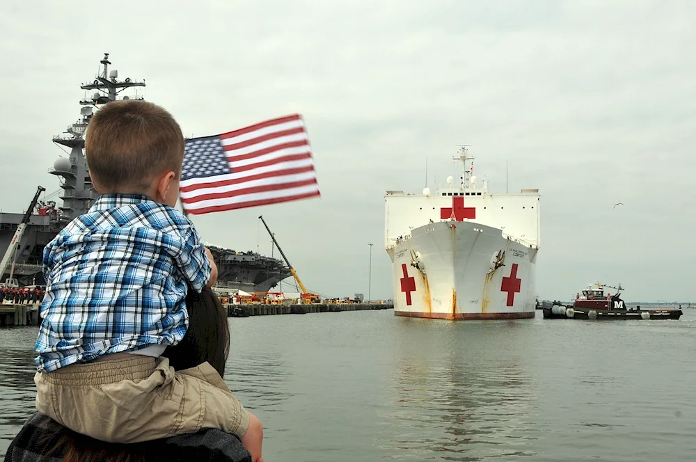 A boy with a Sailboat