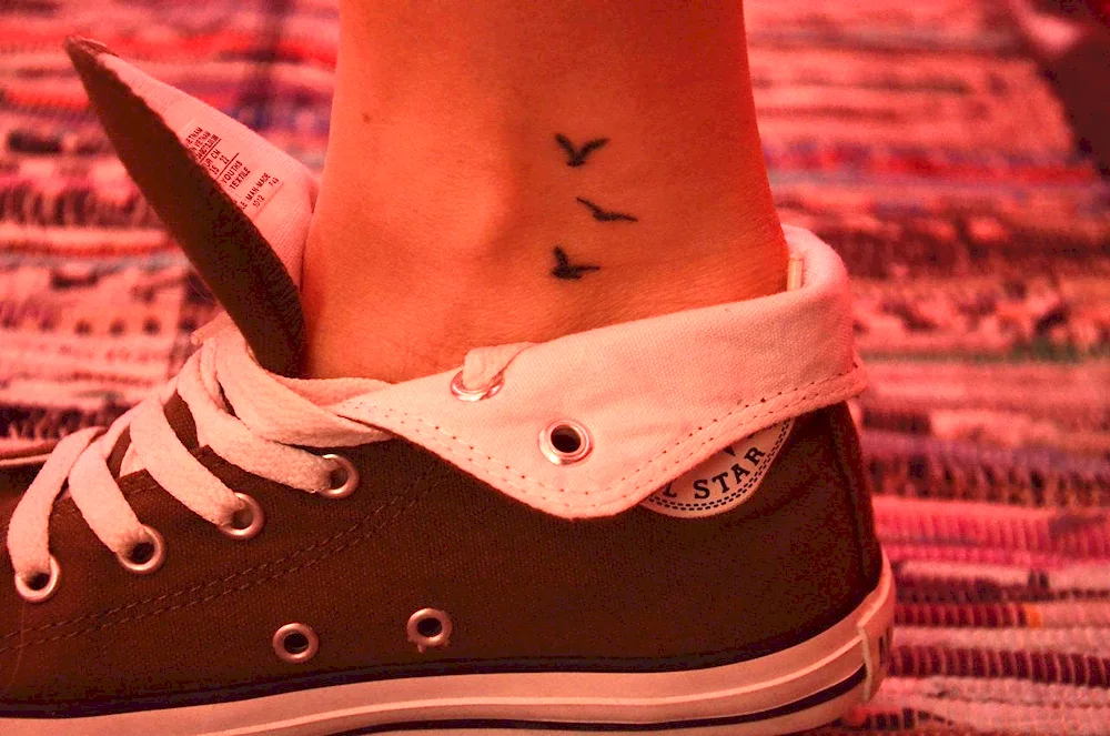 Small tattoos on the ankle