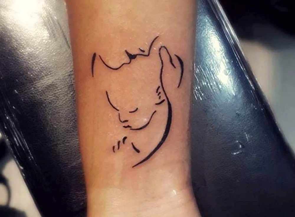 Little tattoo in honour of child