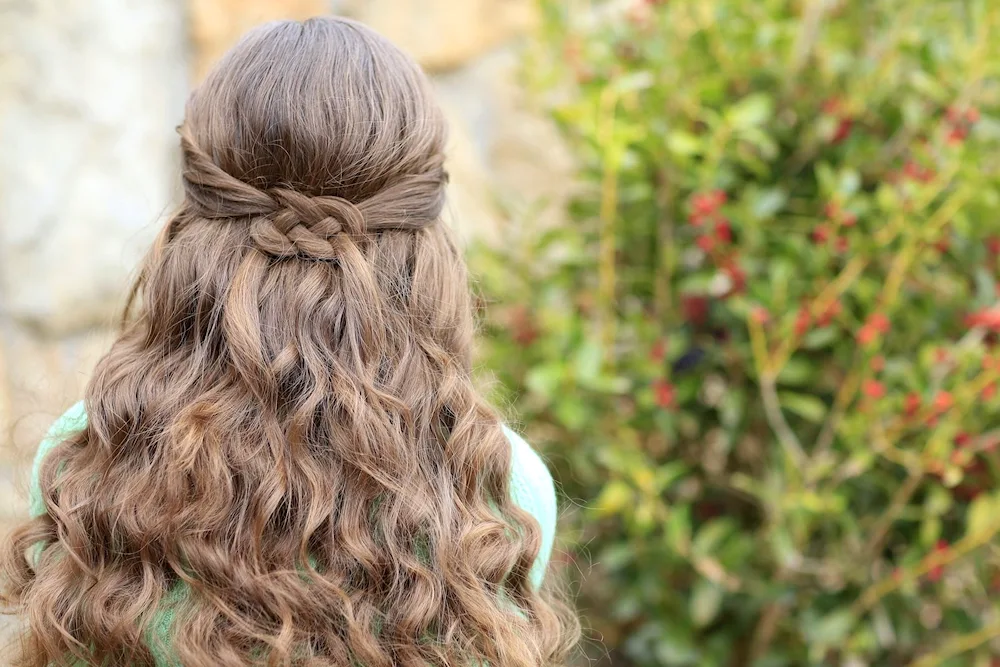 Braided hairstyle with loose hair step by step