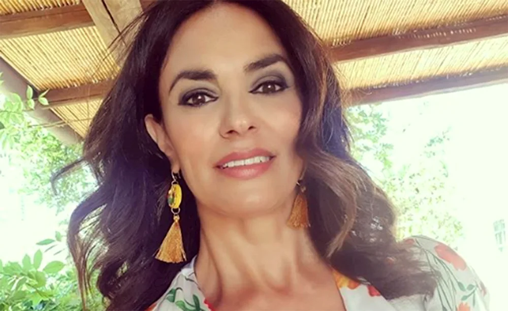 Maria Grazia Cucinotta breasts