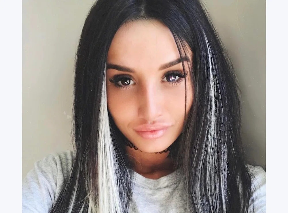 Black hair with white highlights