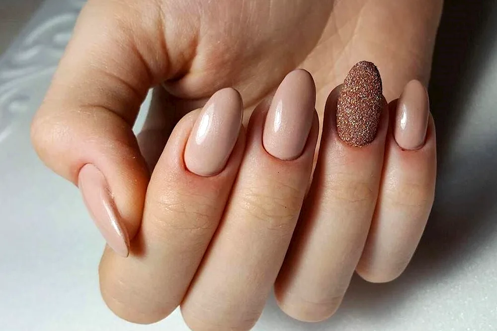 Nude manicure almond