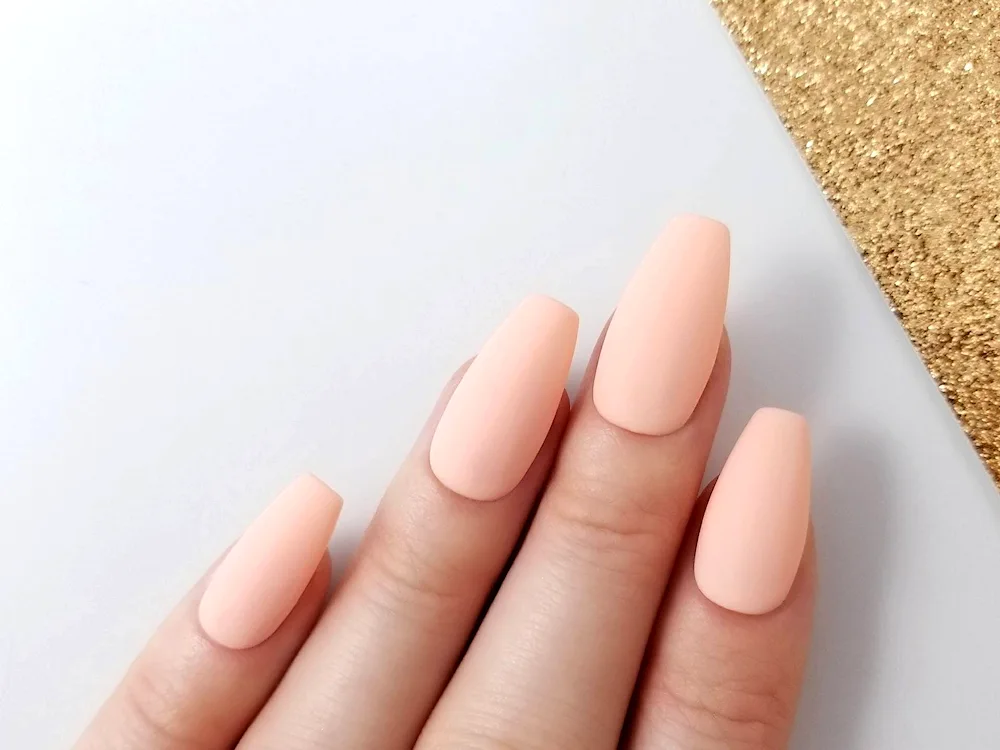 Nude manicure almond