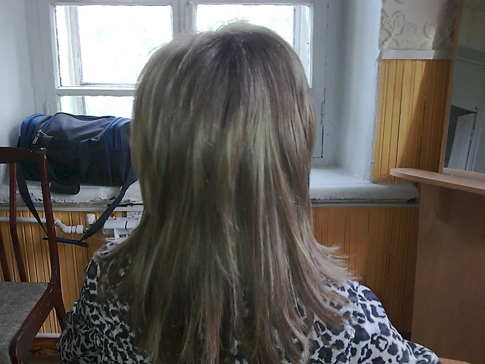 Melting hair on a cap on long hair