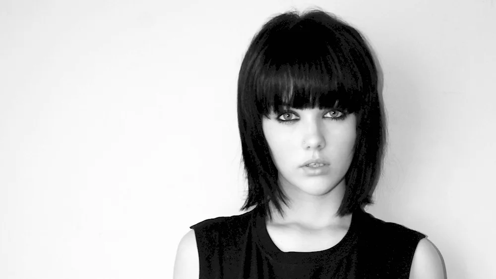 Shoulder-length girl haircut.