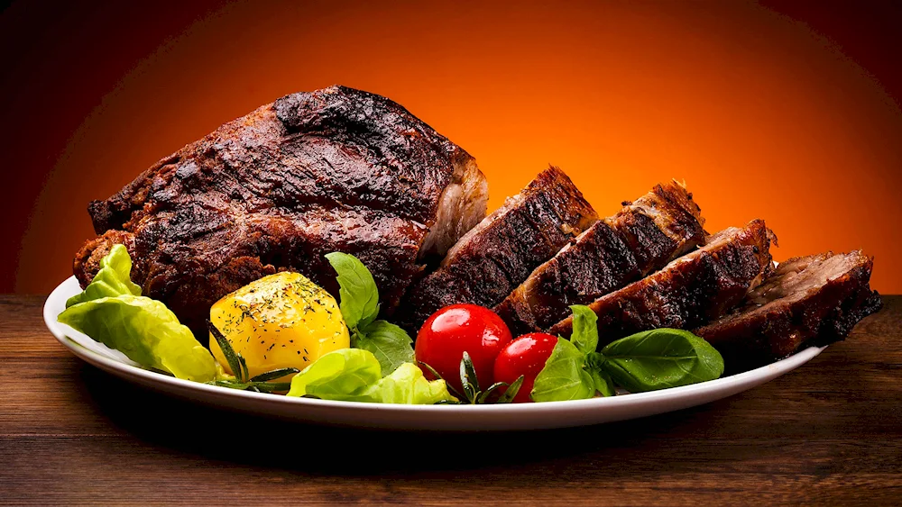 Meat dishes on a wooden background