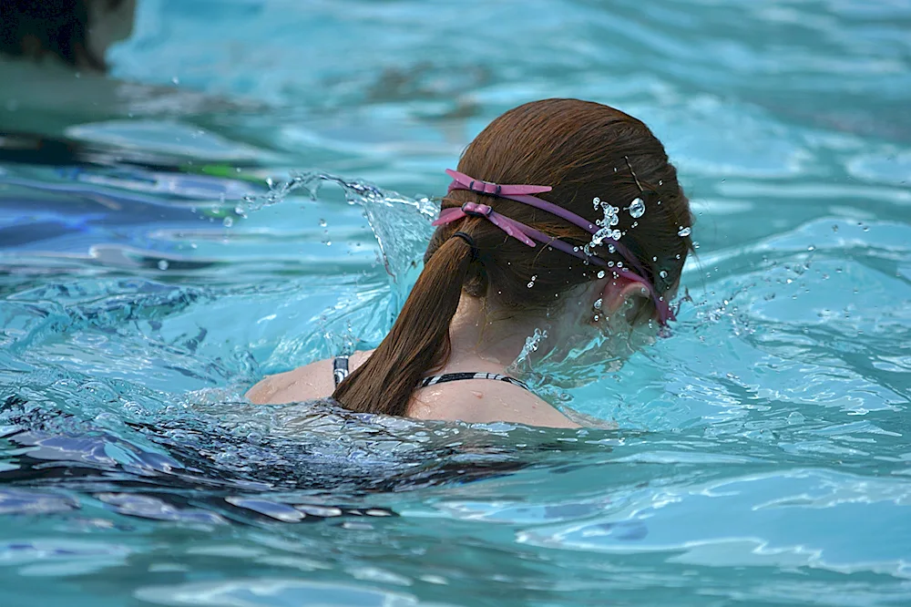 Cute girls in the pool