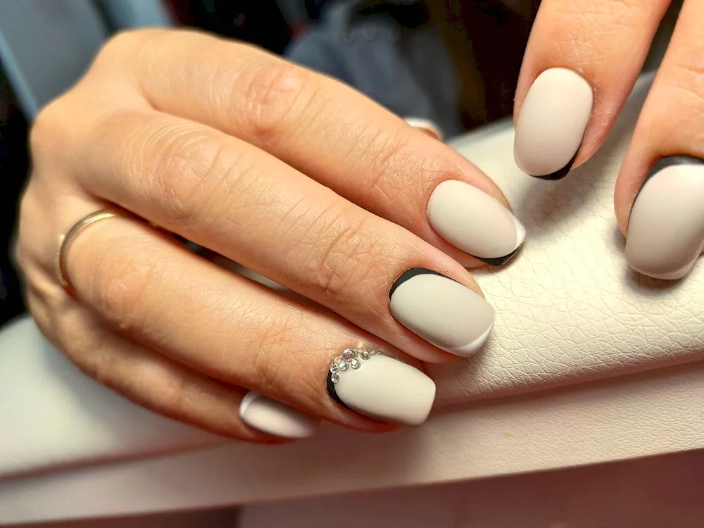 Nude almond manicure