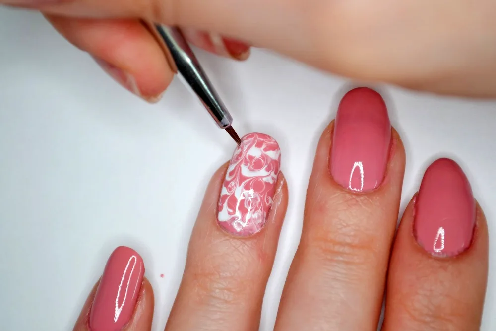 Marble on nails