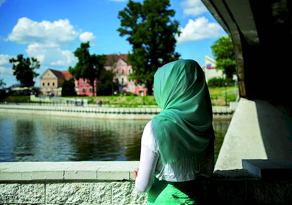 Muslima in hijab from back