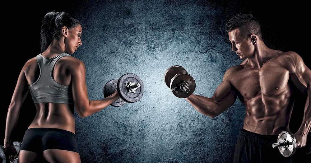 Male and female with dumbbells