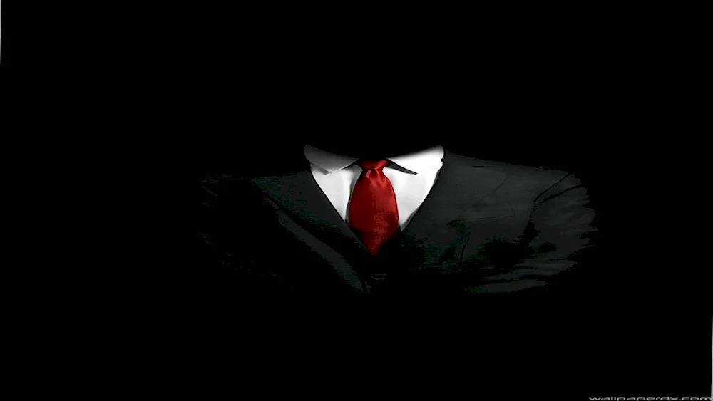 Man in a suit in the dark