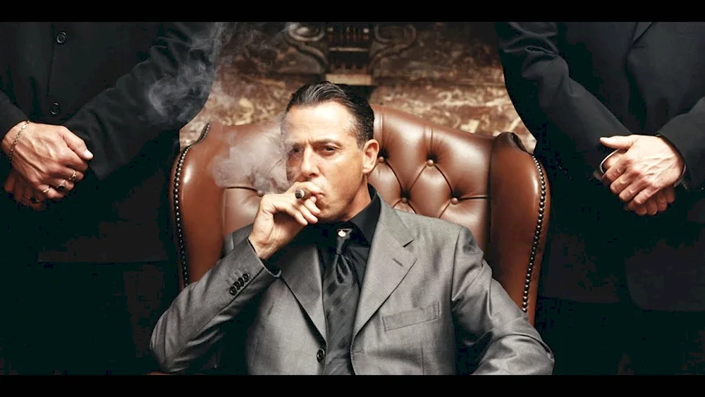 Man in chair with cigar
