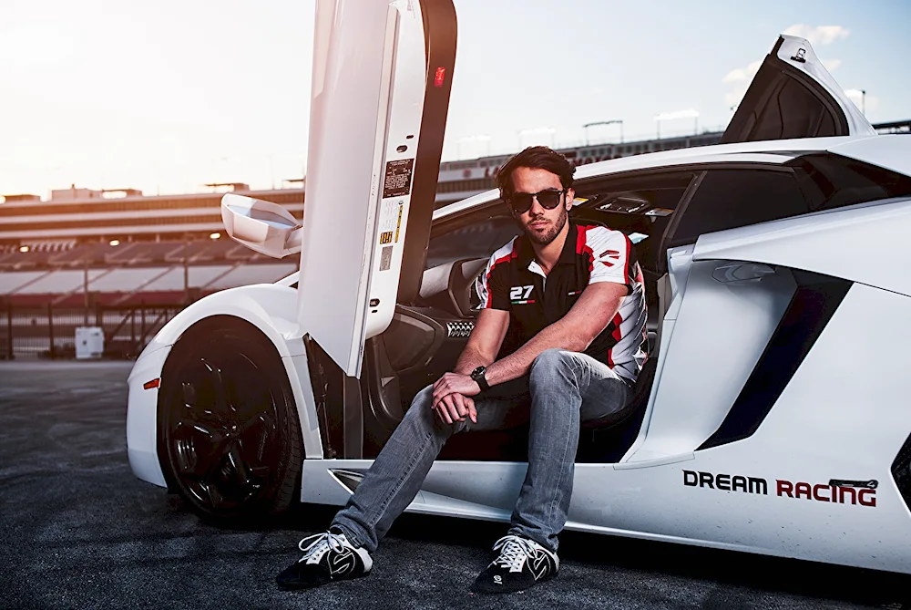 A man in a Lamborghini