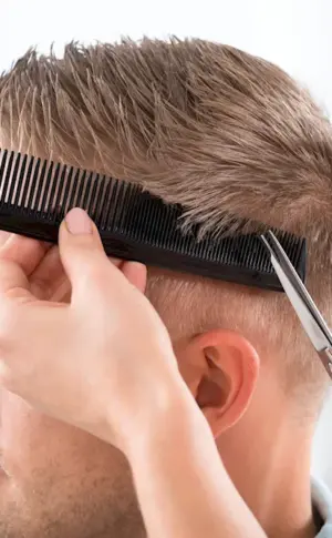 Men's haircut with scissors