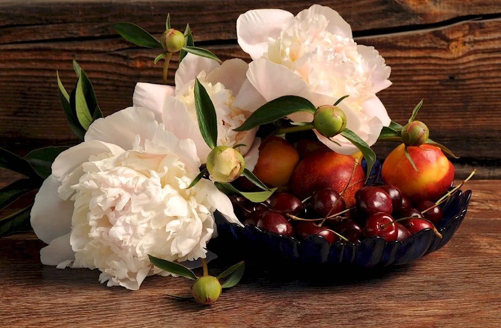 Still life with flowers and fruit