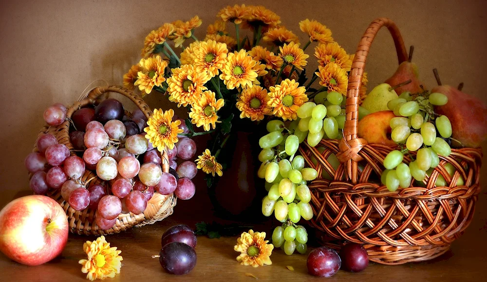 Fruit basket with flowers and fruit