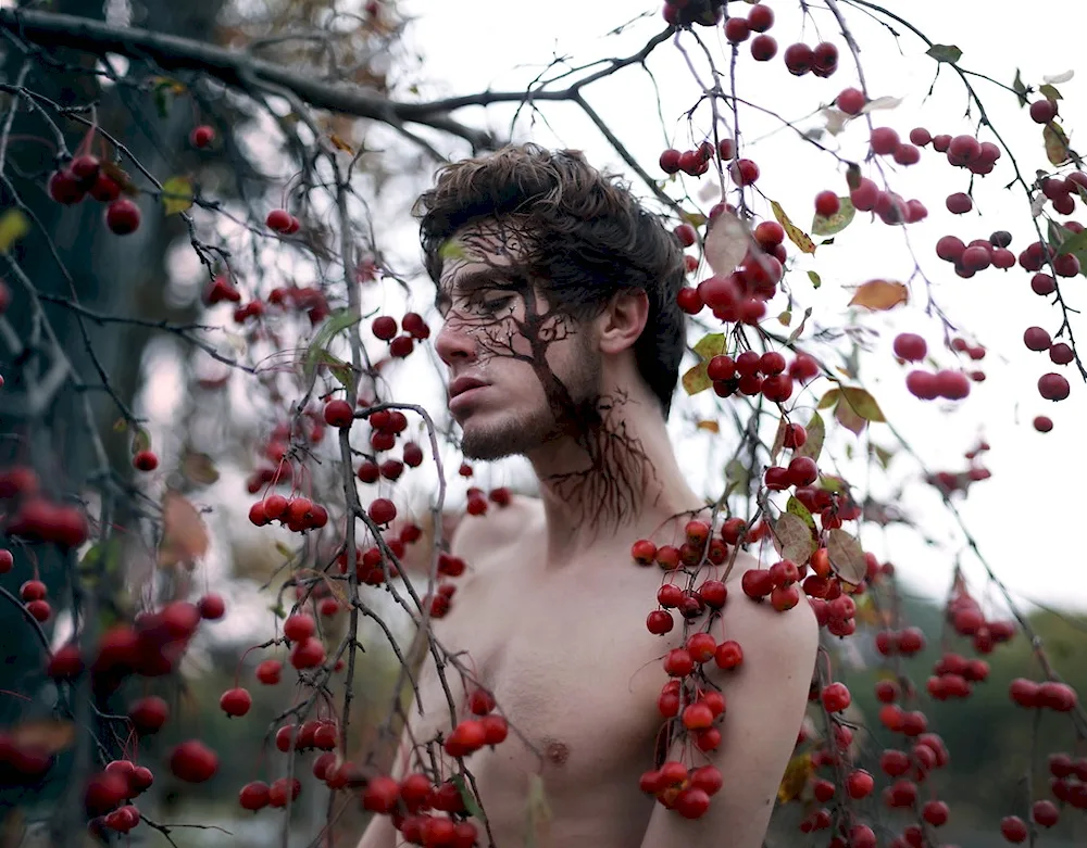 Photoshoot against the background of blossoming trees