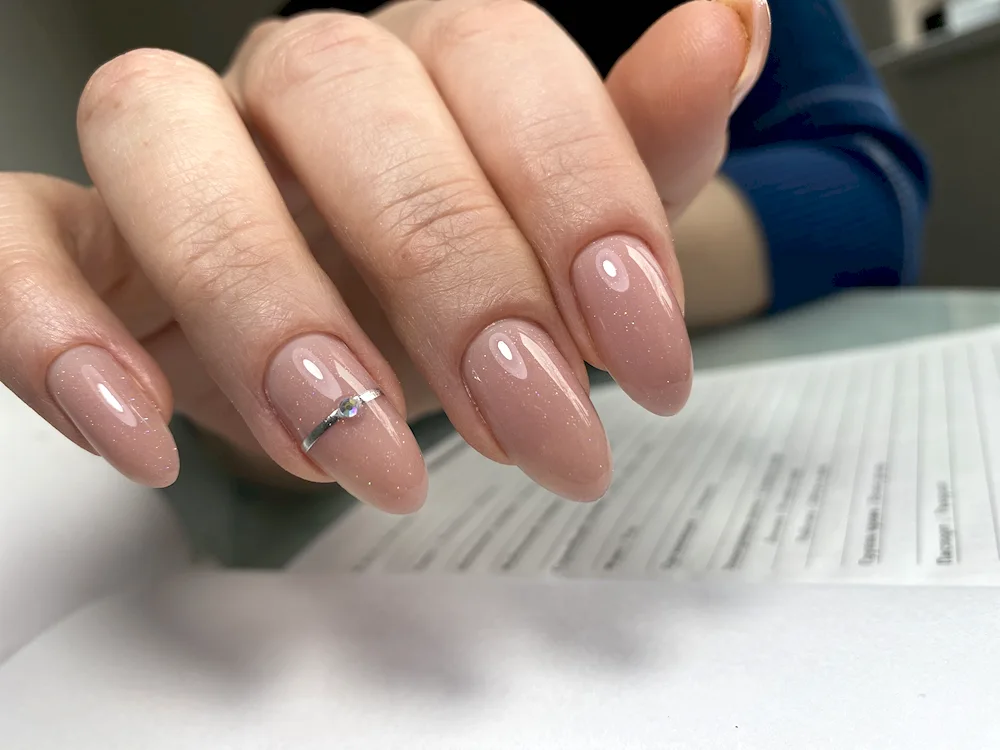 Nude manicure almond