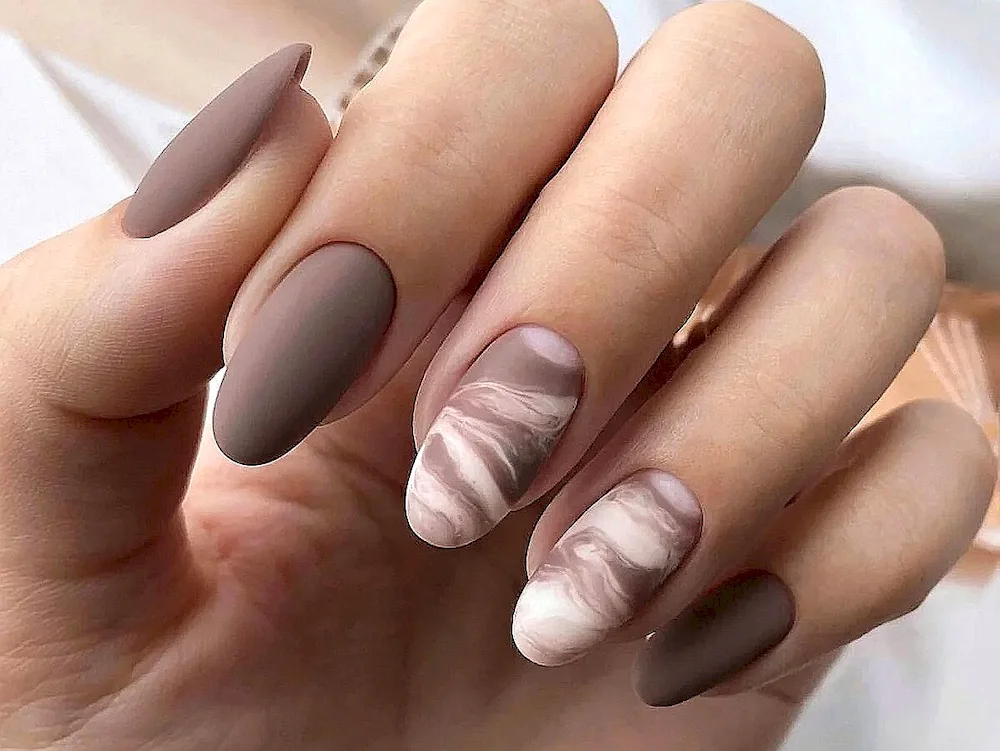 Nude almond manicure