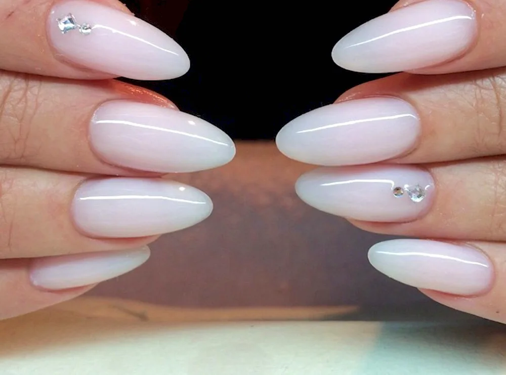 Nude manicure French almond