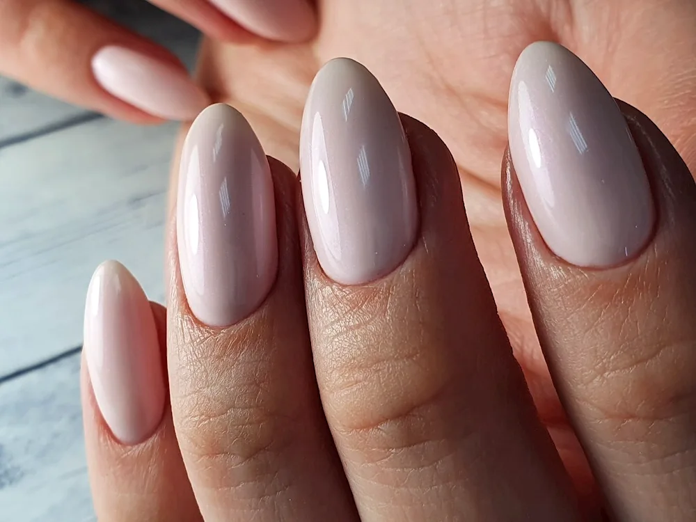 Nude manicure almond