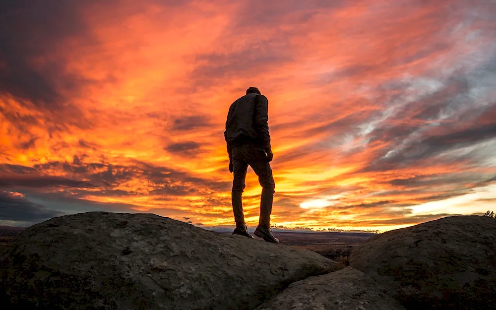 The lonely man at sunset