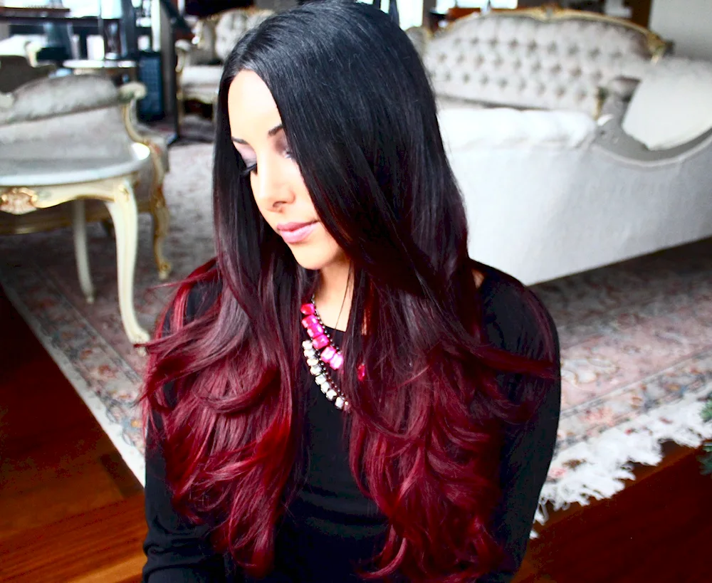 Burgundy shading on long dark hair