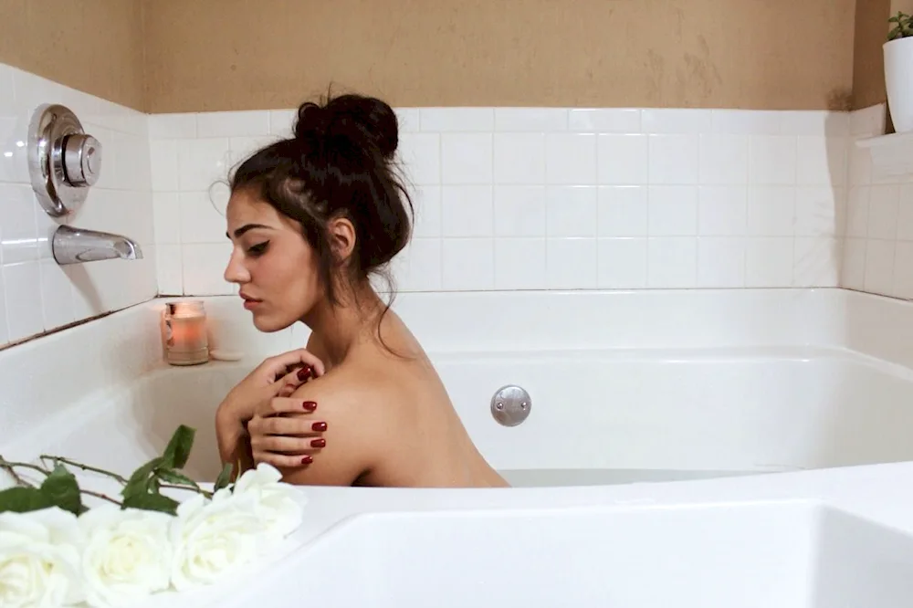 Beautiful girl in the shower. girl in the bath