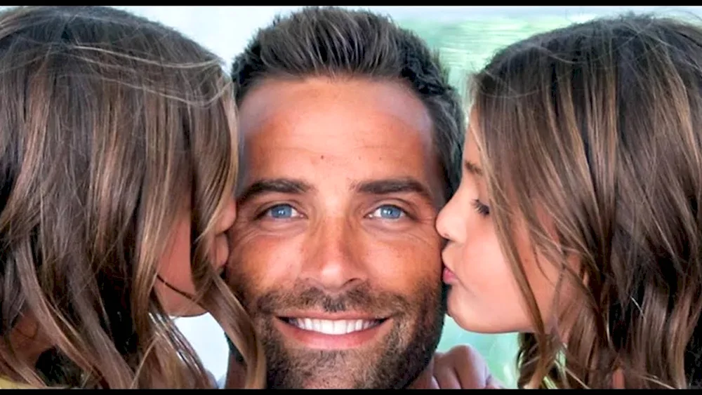 Dad with two daughters