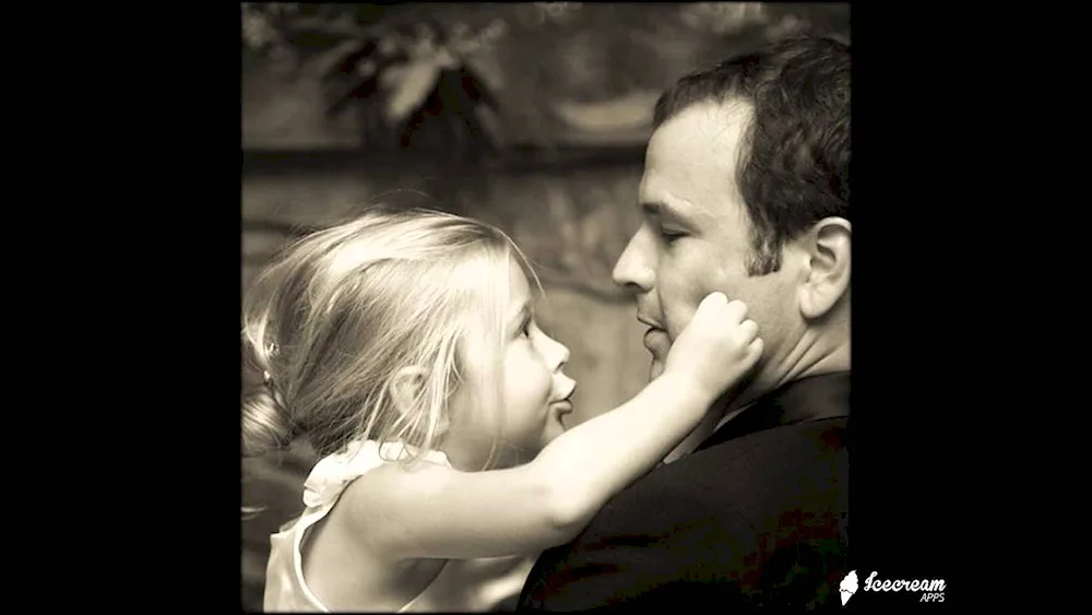 Papa hugging father and daughter