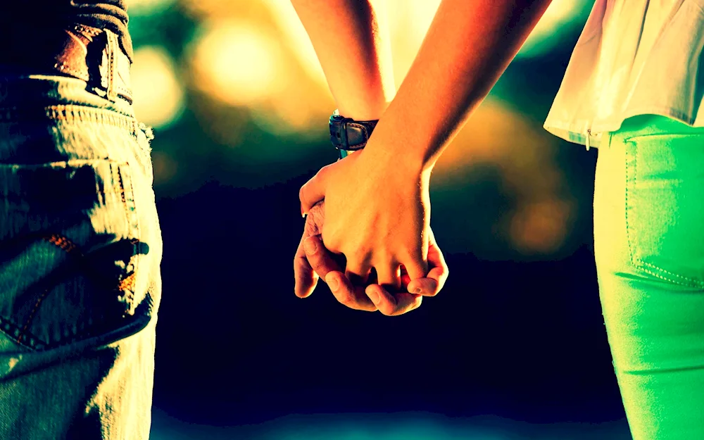 Boyfriend and girl holding hands