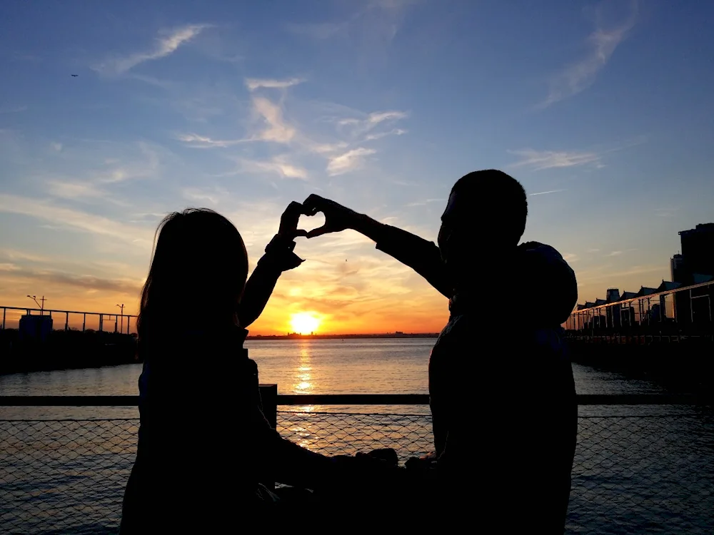 Boy and girl at sunset