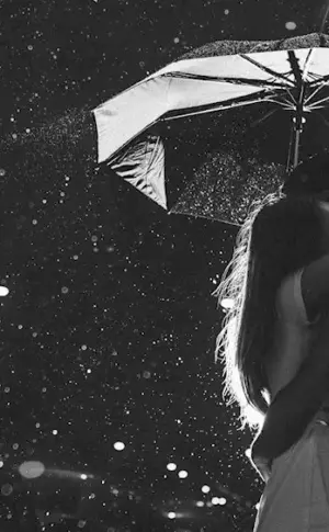 Guy and girl in the rain