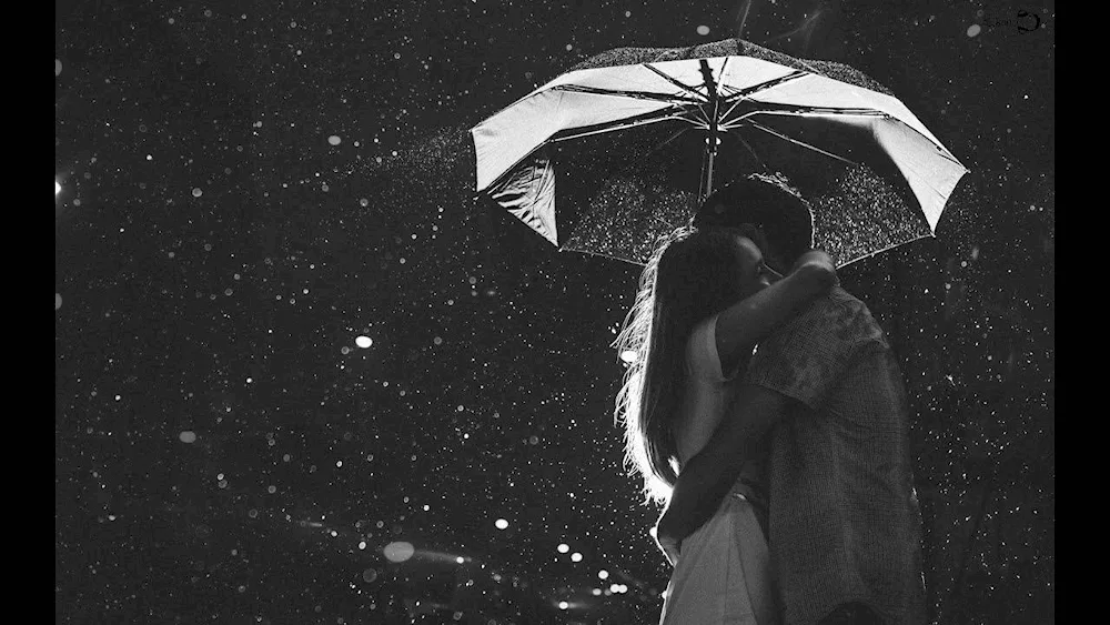 Guy and girl in the rain