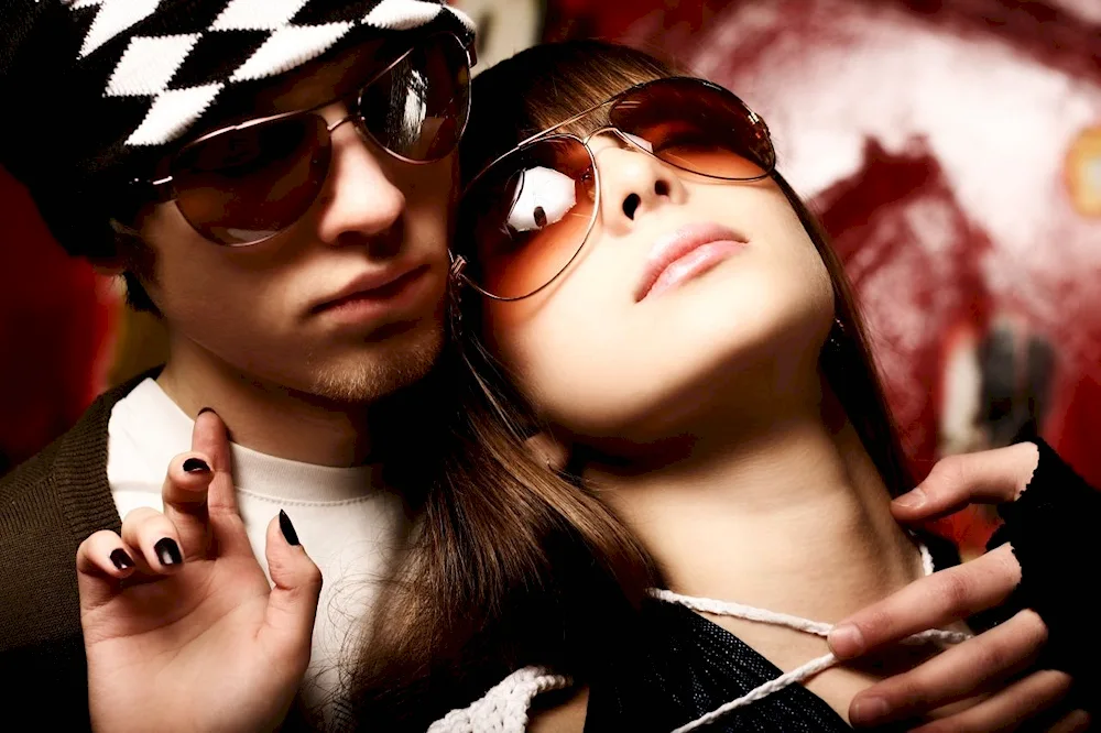 Boy and girl in sunglasses