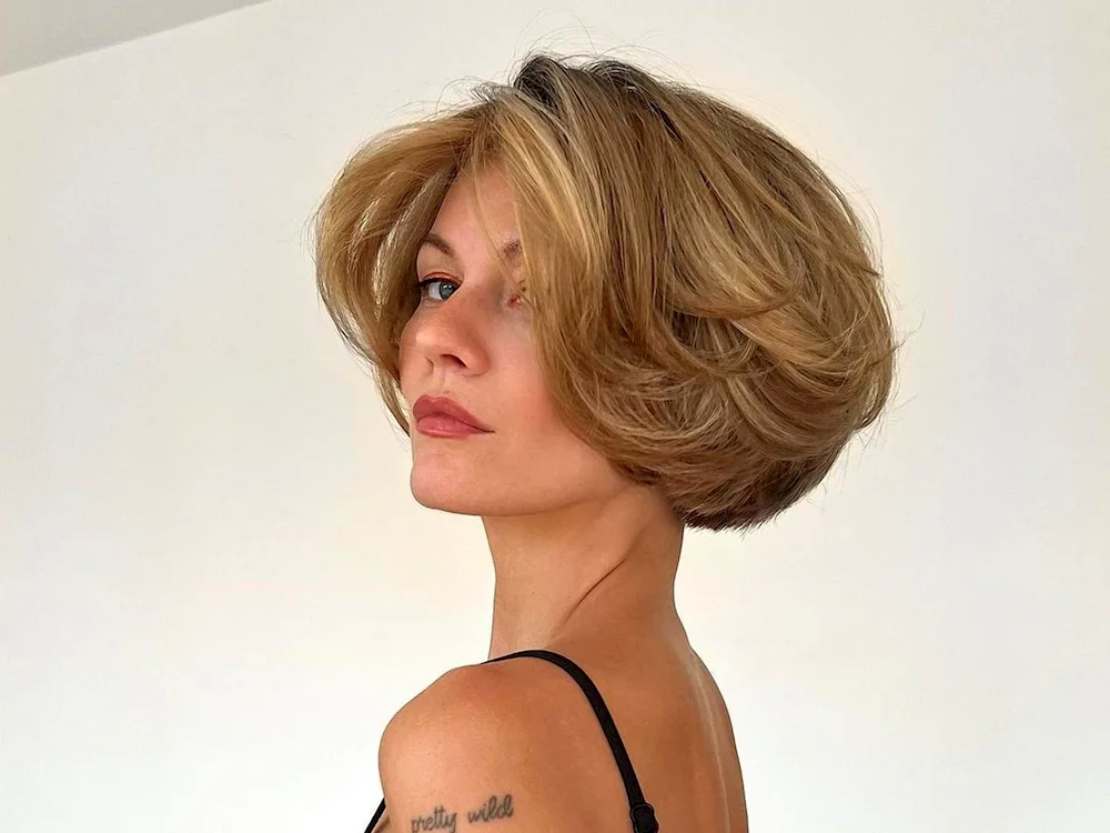 Boy with a bouffant bob