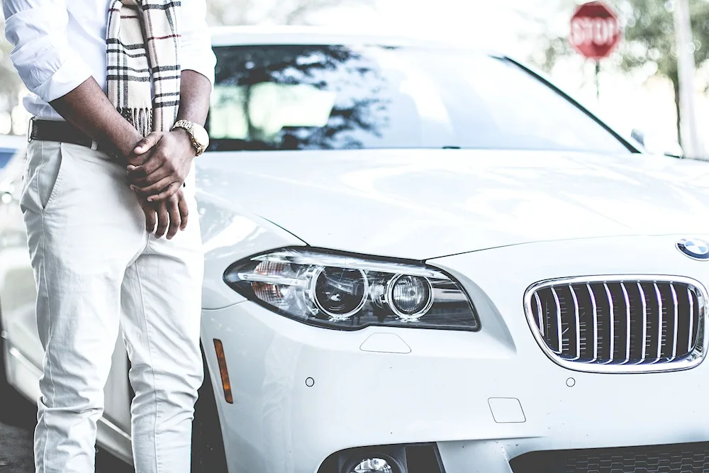 A guy near a car