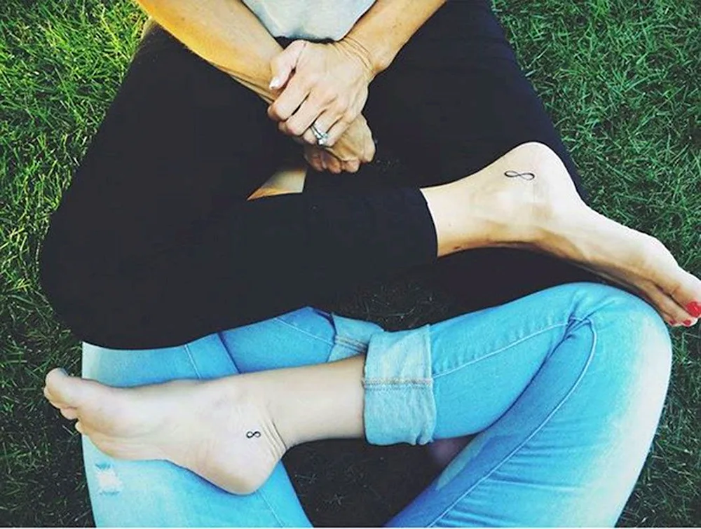 Pair tattoos for mum and daughter