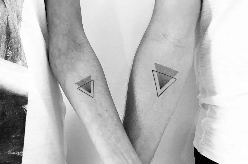 Pair geometric tattoos