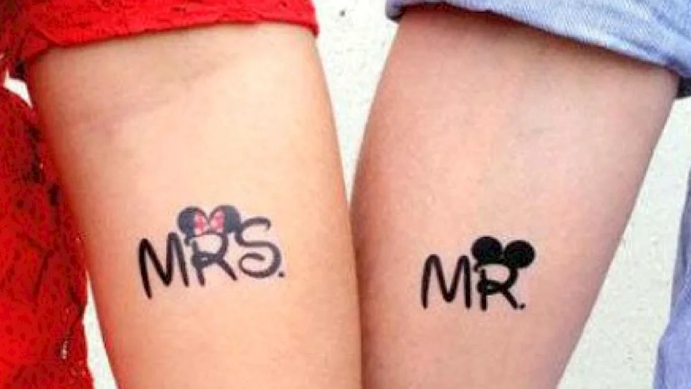 Pair tattoos.