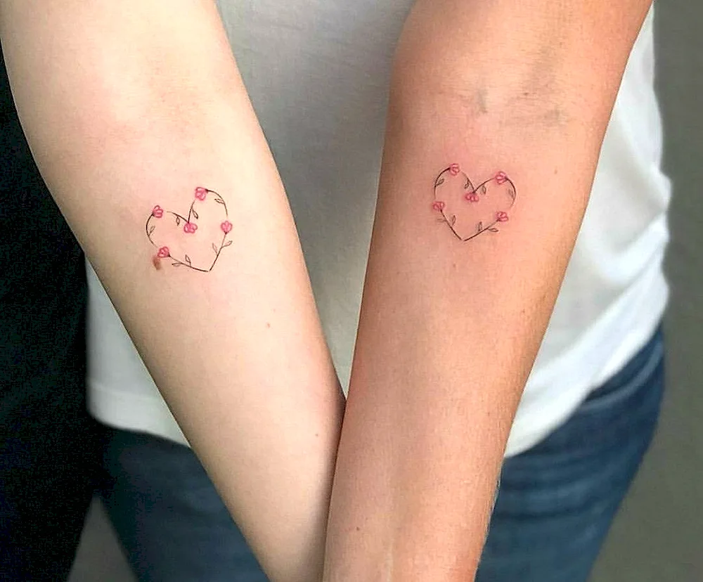 Pair tattoos for mum and daughter