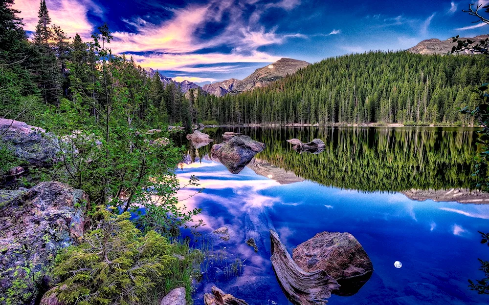 Puzzle lake in the mountains