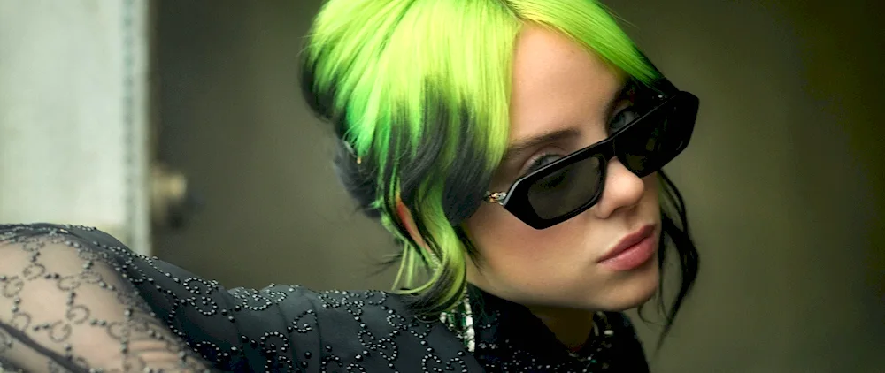 Singer with green hair