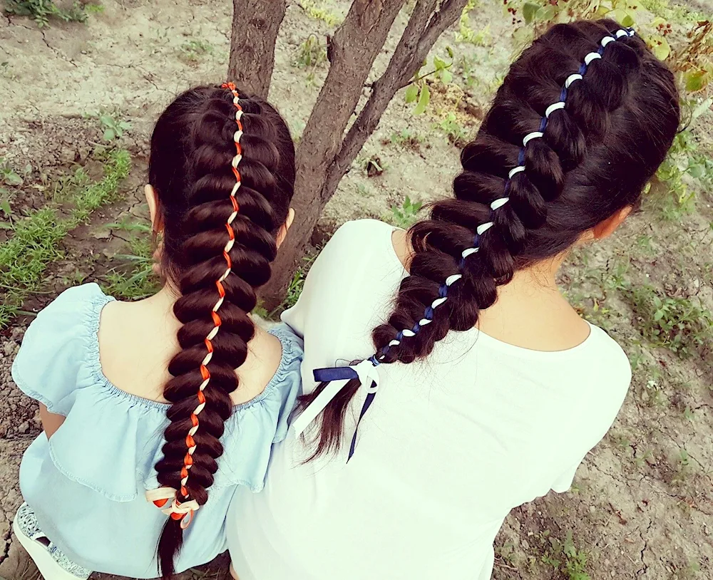 Ribbon braid hairstyles with ribbons for a girl with long hair